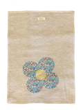 Linen tea towel with Liberty flower appliqué in Australia